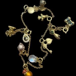 JOAN RIVERS GROUP OF 11 CHARMS